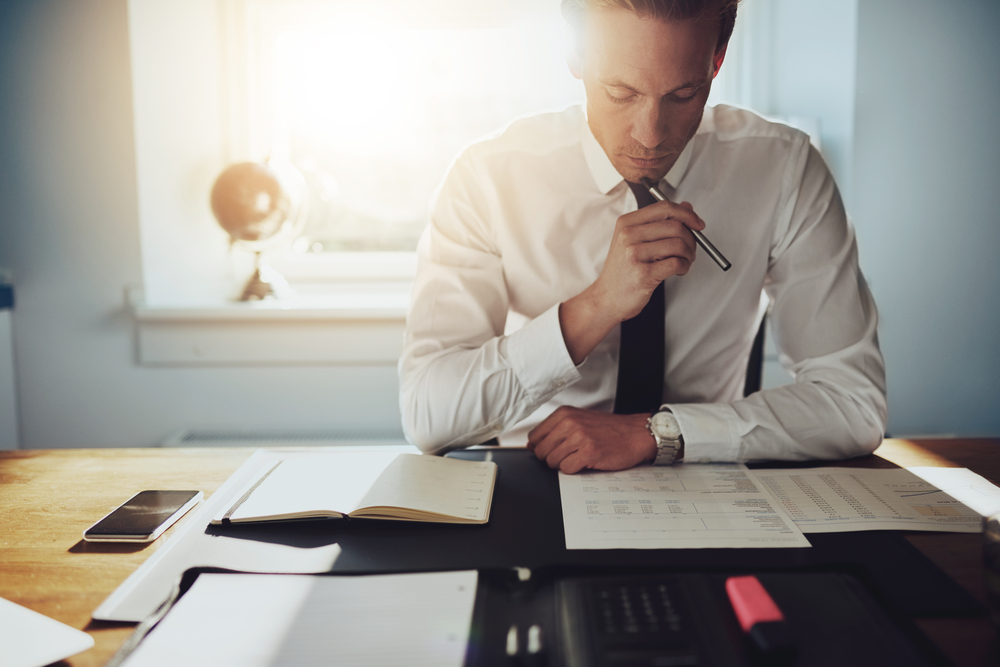 Man looking over documents